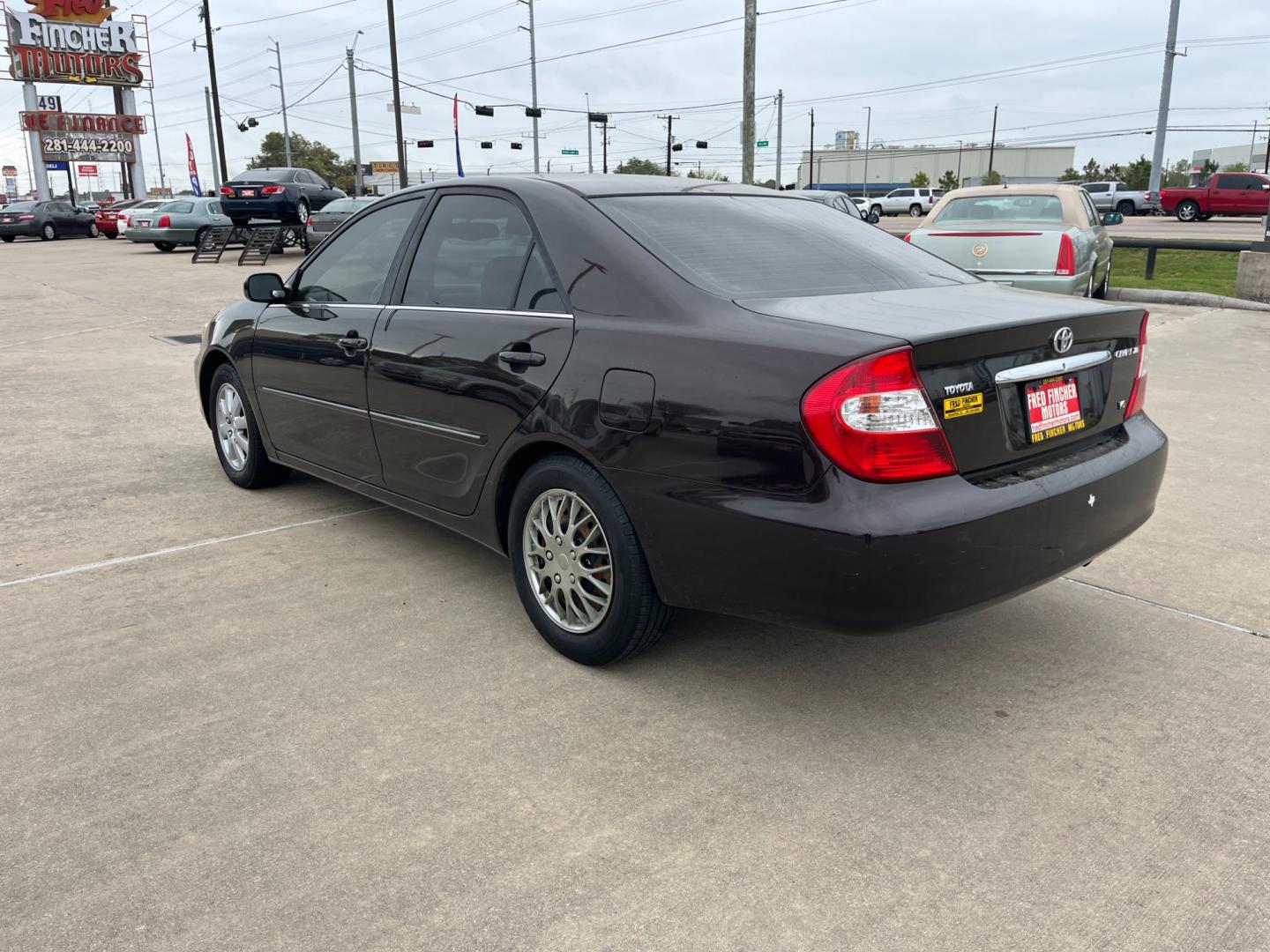 2002 BROWN /tan Toyota Camry LE V6 (JTDBF32K420) with an 3.0L V6 DOHC 24V engine, 4-Speed Automatic Overdrive transmission, located at 14700 Tomball Parkway 249, Houston, TX, 77086, (281) 444-2200, 29.928619, -95.504074 - Photo#4